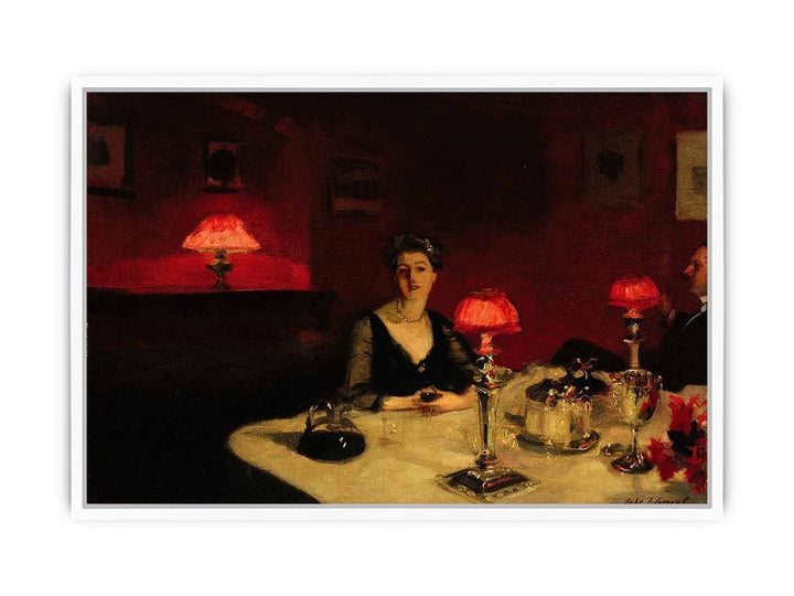 A Dinner Table At Night Framed Print